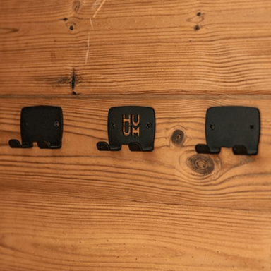 These towel hooks create an elegant and seamless way to hang towels, robes, or other essentials within your sauna or bathroom space