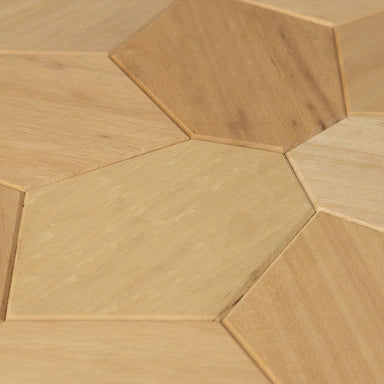The geometric pattern of EmotionWalls Hexagon Abachi wood wall panels beautifully complement any living environment.