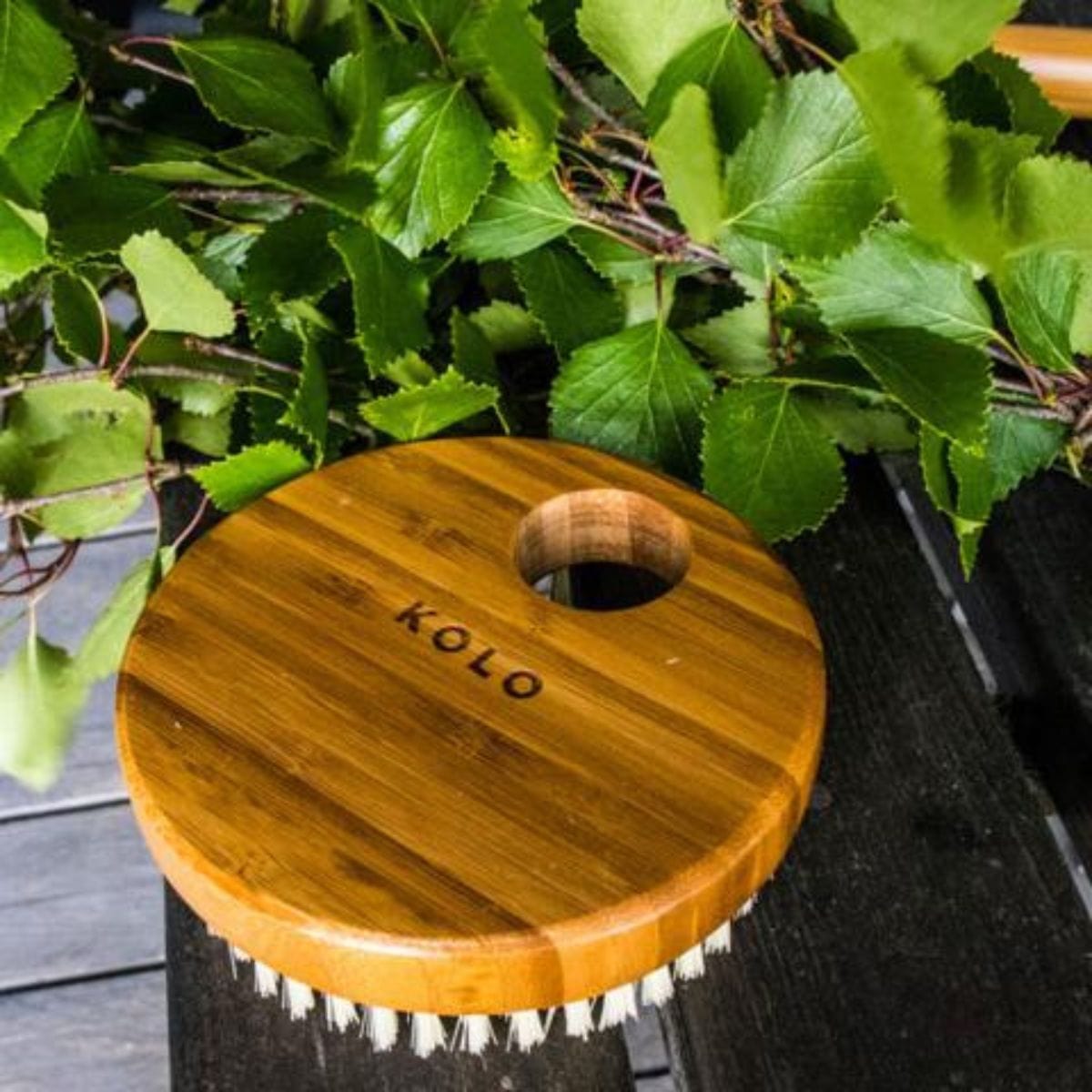 Heighten the sauna’s benefits to healthy-looking skin by exfoliating with the KOLO round bamboo bath brush