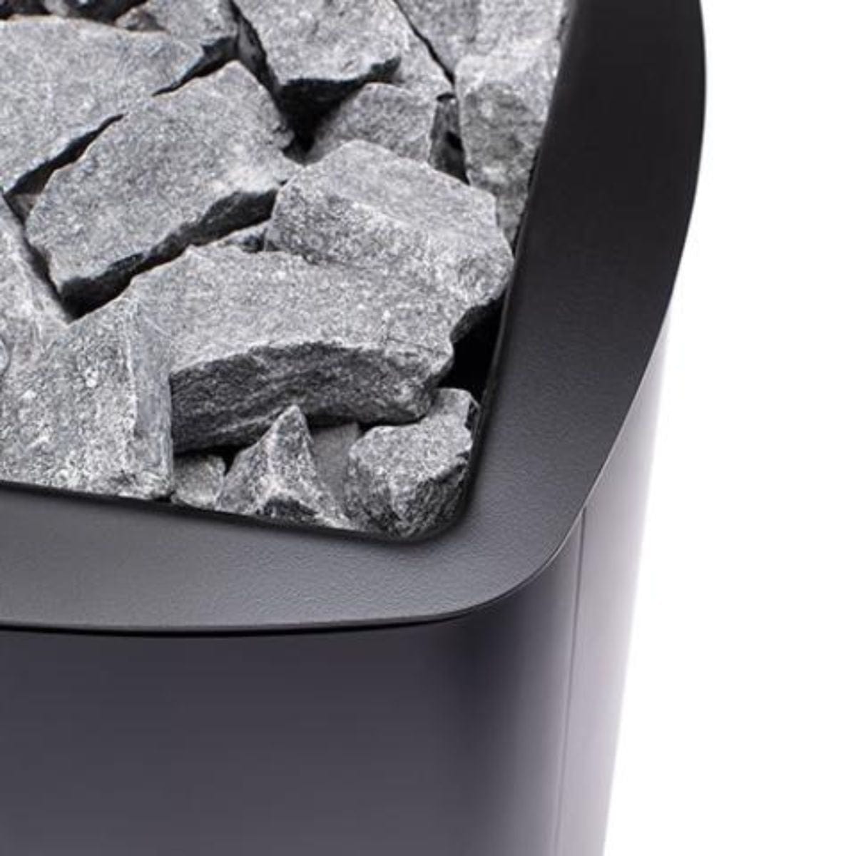 The Narvi NC 24 Black Sauna Stove has a comfortable wooden handle.