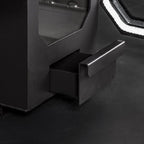 Close-up of a black drawer with metallic handle on a dark background