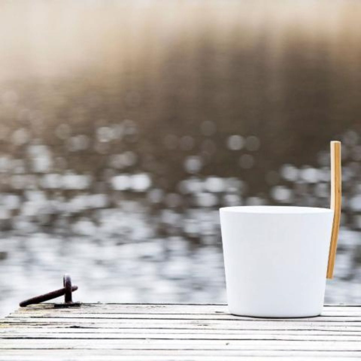 Long-lasting Bamboo Ladle that can also be used as a handle or set on top of the bucket