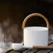 This sauna bucket set will withstand the extreme heat of the sauna, yet its handle remains cool to the touch