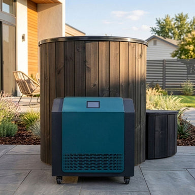 Blue outdoor refrigerator next to a wooden barrel on a patio
