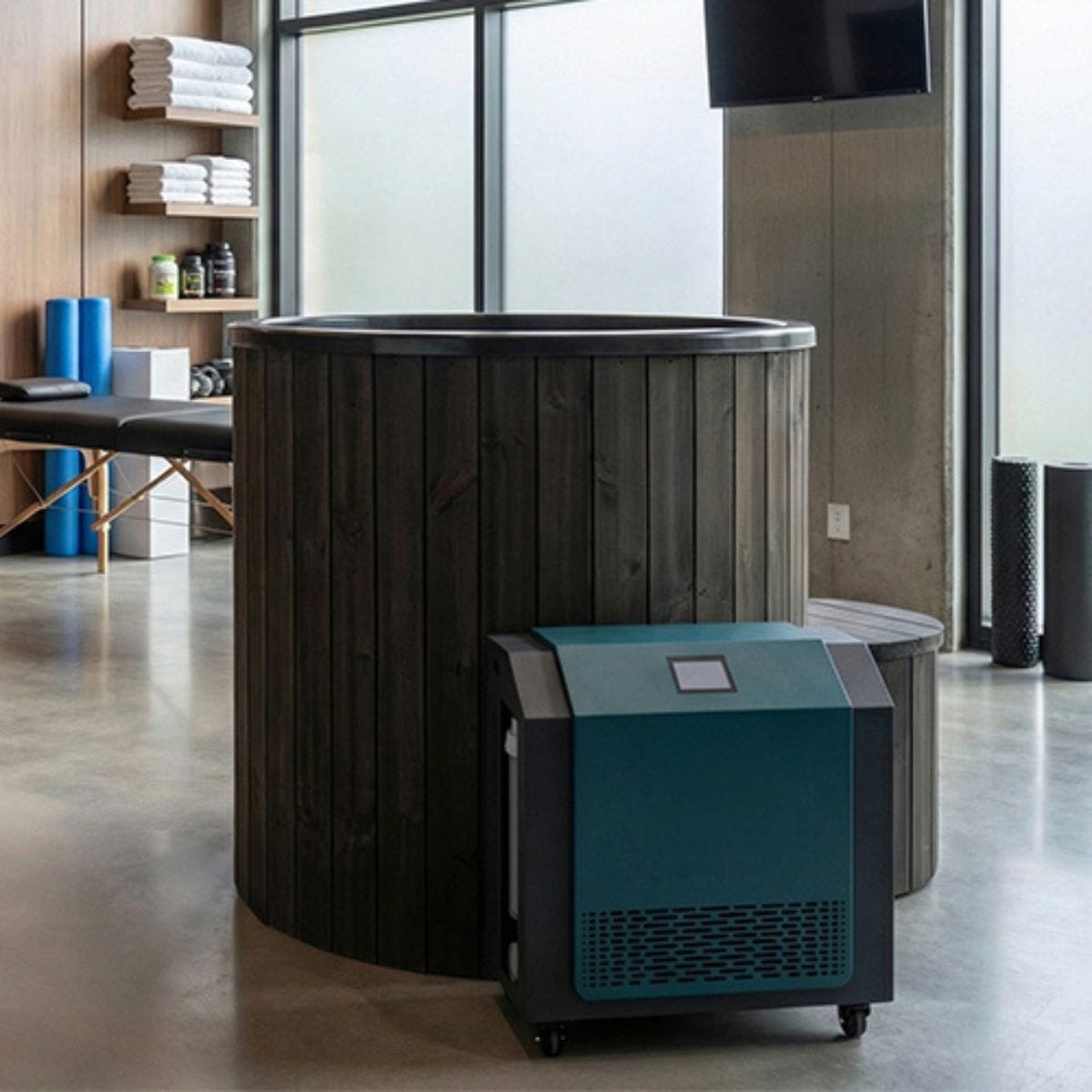 Hot tub and portable water treatment system in a modern indoor setting