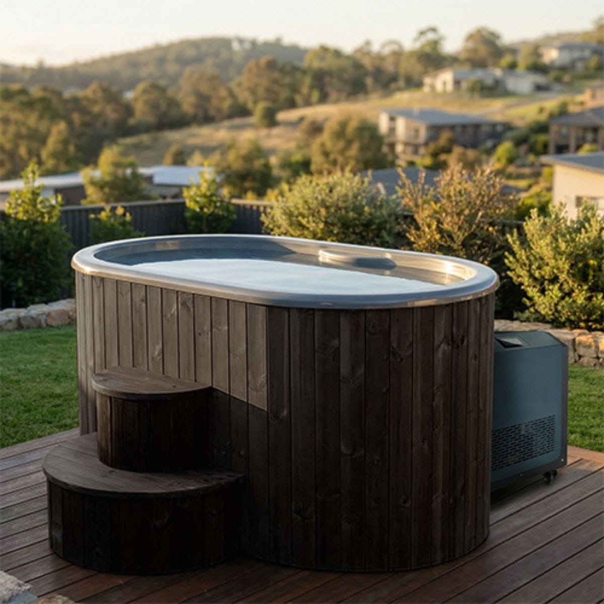 Wooden hot tub on a wooden deck with a scenic background