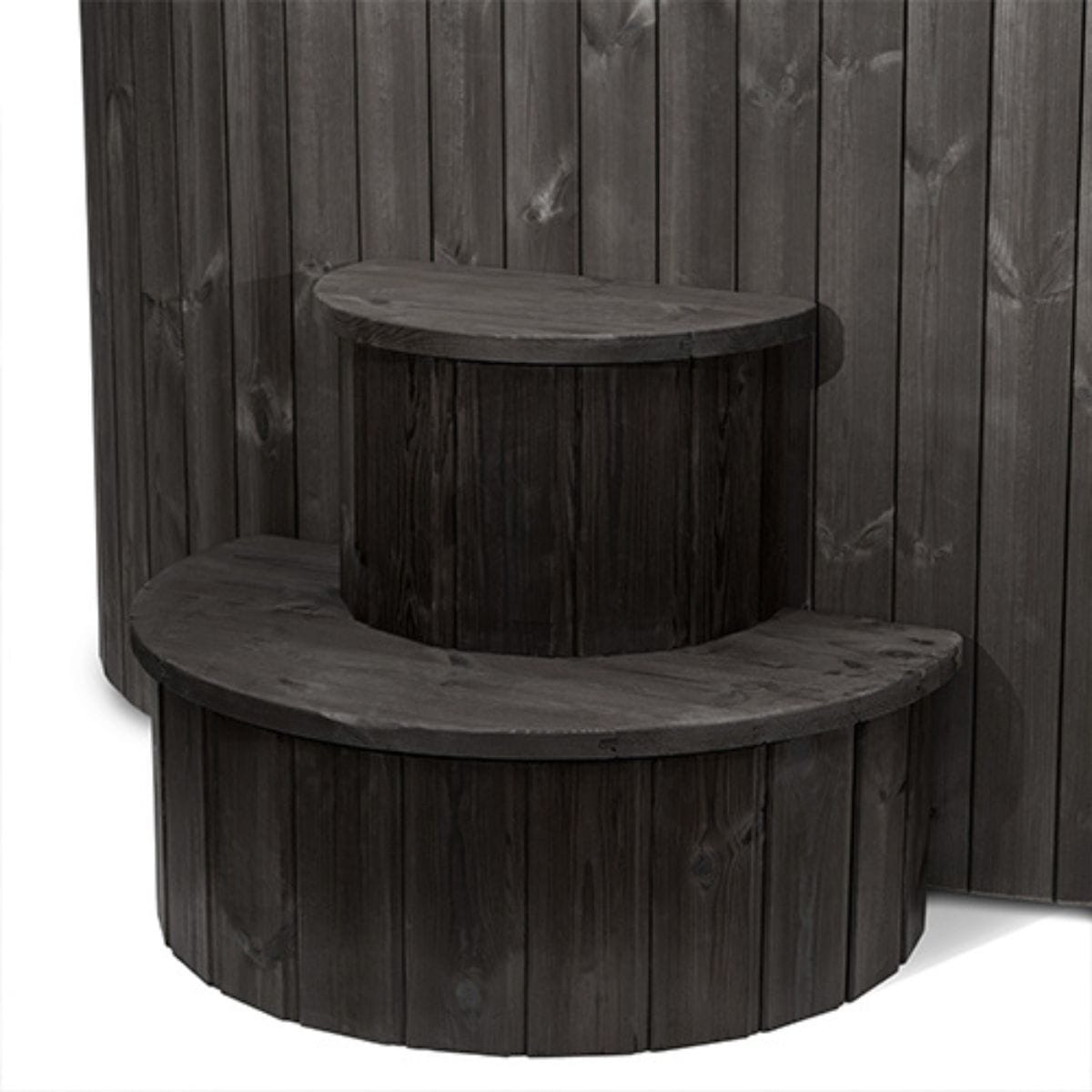 Wooden step and seating area against a wooden fence