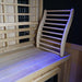 Inside infrared sauna view, showing bench and ergonomic adapter for lumber support. 